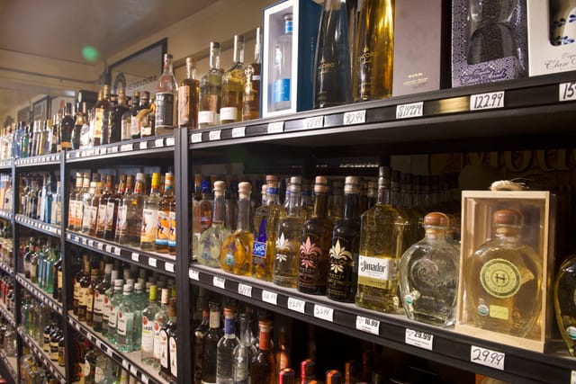 shelves in store with liquor